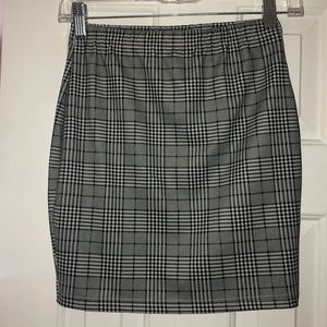 Black, gray and white checkered skirt
